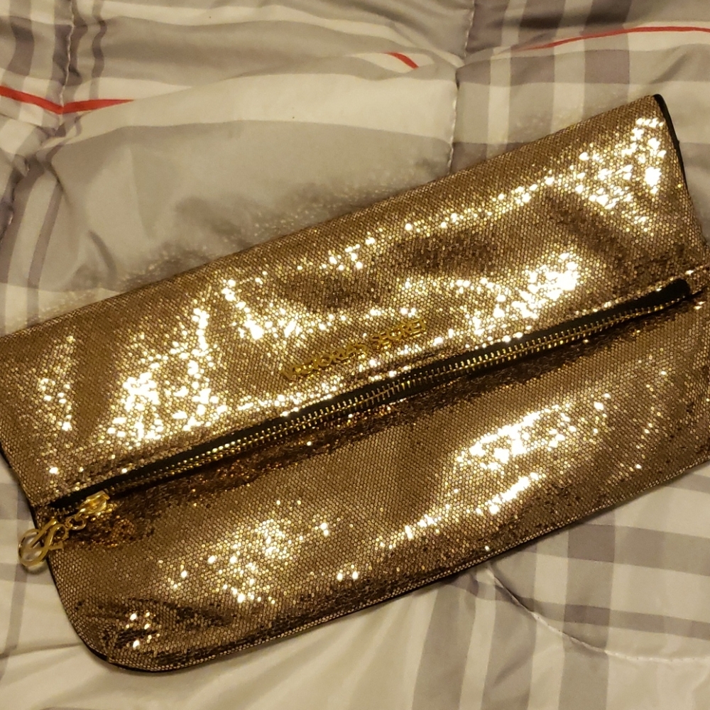 Gold clutch VS